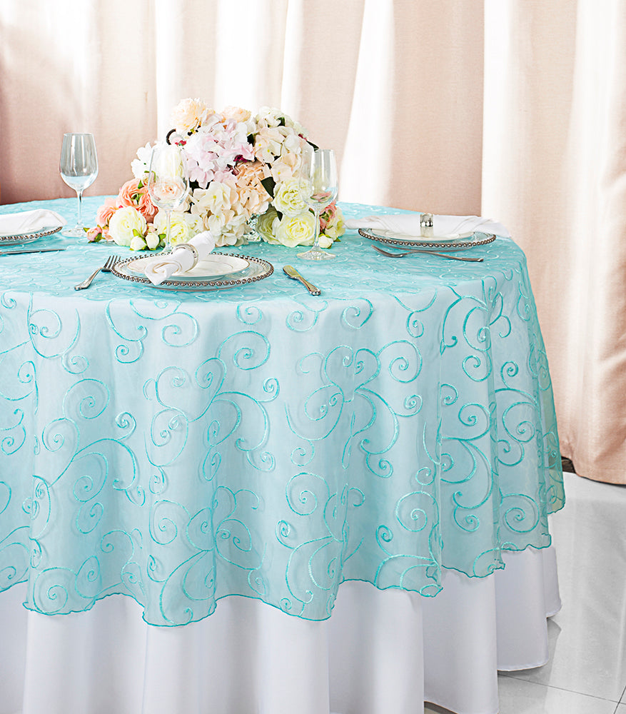 Superposition de table ronde en organza brodée sans couture de 108 po - Bleu piscine (1 pièce)